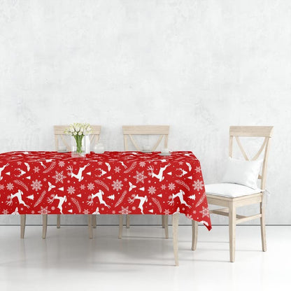 Festive Christmas tablecloth featuring reindeer and snowflakes.