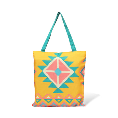 A vibrant yellow and blue tote bag featuring a delightful pink and turquoise design. Perfect for adding a pop of color to any outfit.