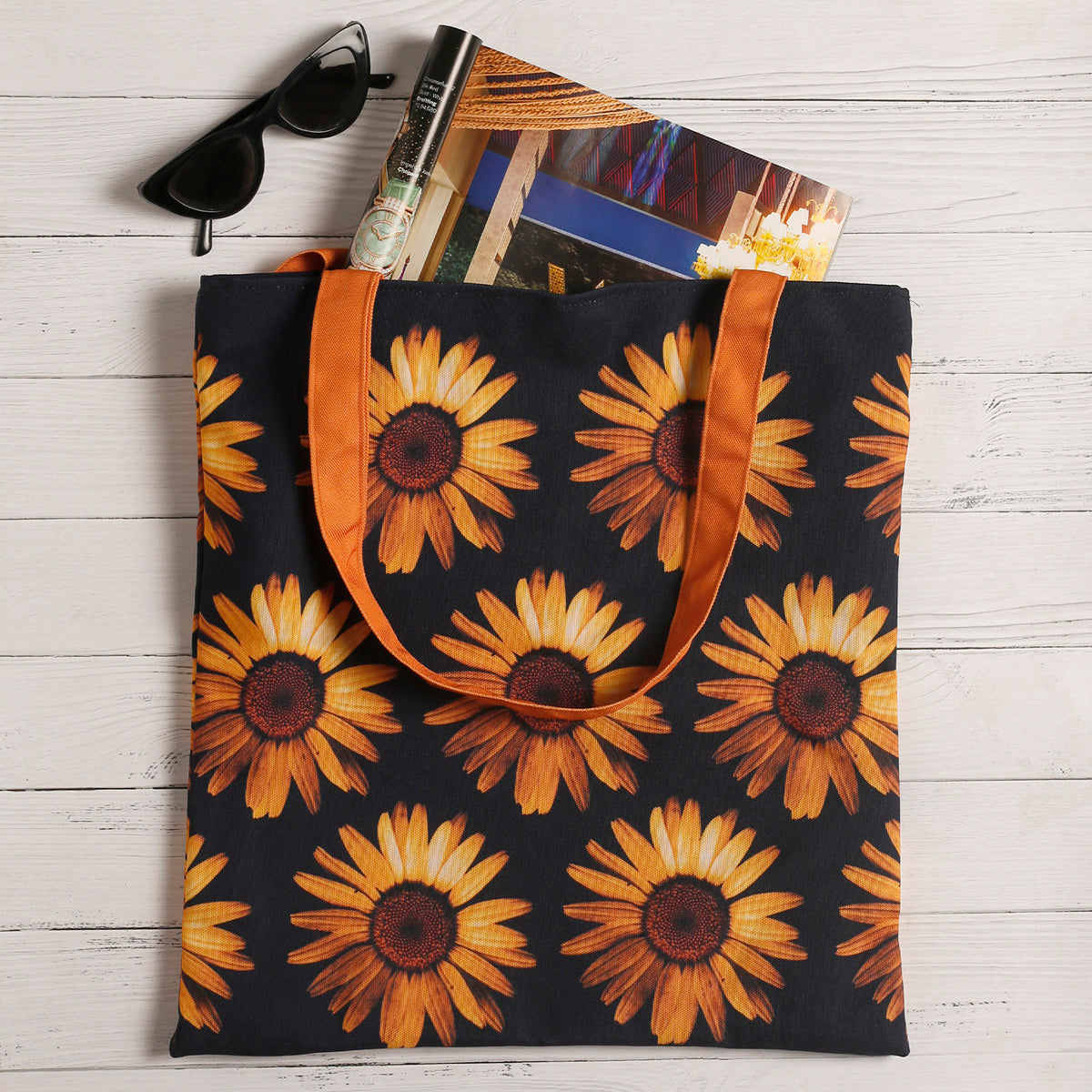 A tote bag adorned with vibrant sunflowers, adding a touch of nature's beauty to your everyday essentials.