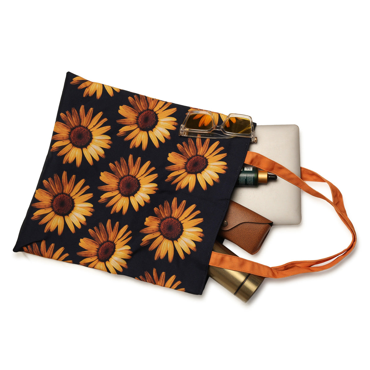 A stylish tote bag with black and orange colors, adorned with beautiful sunflowers. Perfect for adding a pop of color to your outfit!
