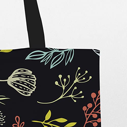 Zoom View Stylish black tote with colorful floral and leaf pattern.