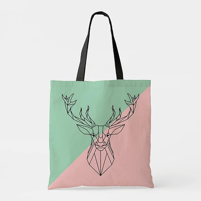 Pink and green tote bag with deer head design.