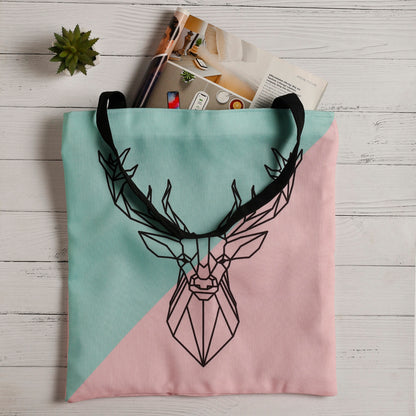 A stylish tote bag in pink and green with a deer head design. Perfect for adding a touch of nature to your outfit.
