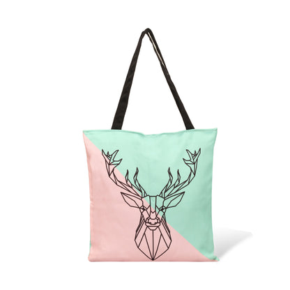 Stylish tote bag in pink and green with deer motif.