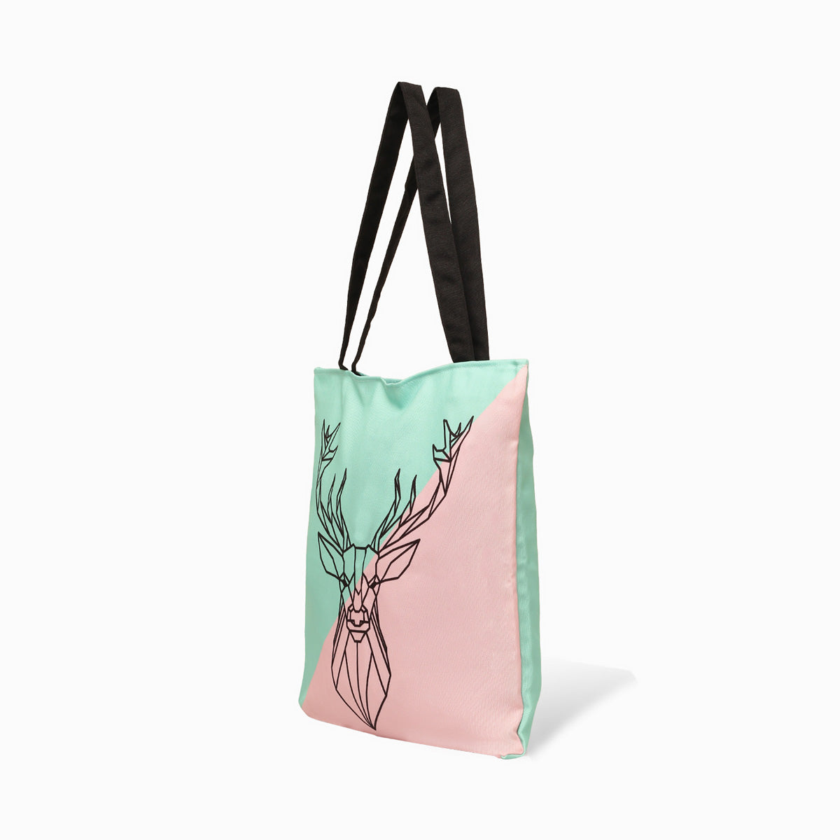 side view of Pink and green tote bag with deer head design.