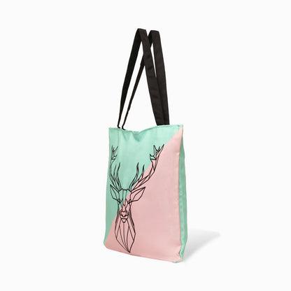 side view of Pink and green tote bag with deer head design.