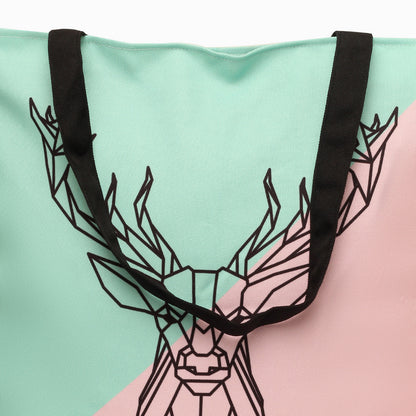 zoom view of Pink and green tote bag with deer head design.