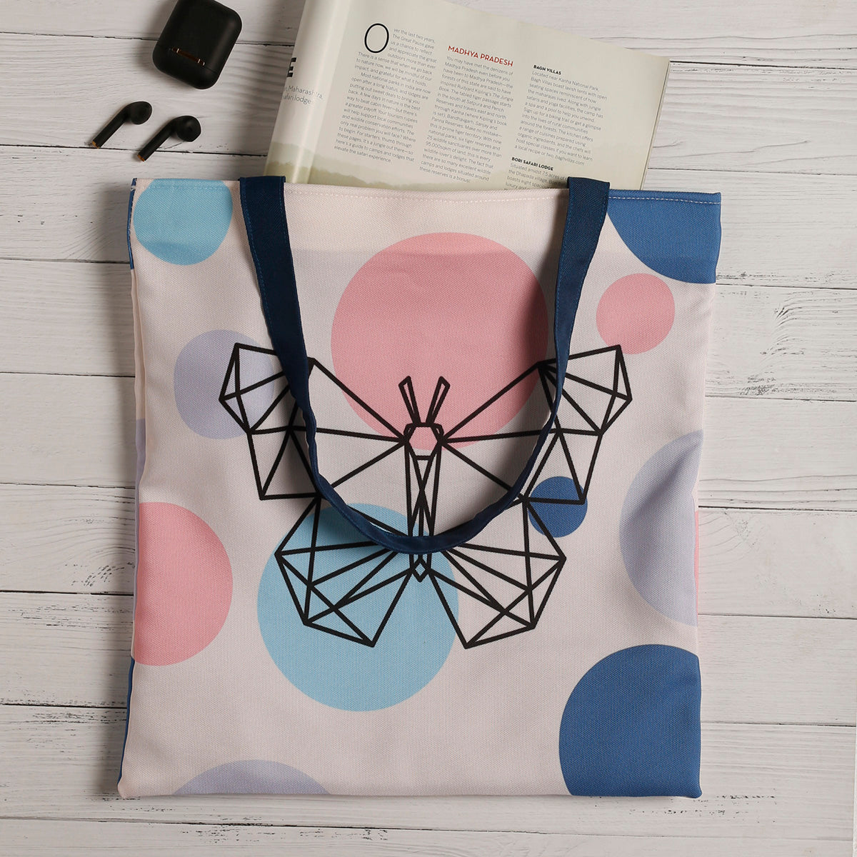 A tote bag featuring a beautiful butterfly design, adding a touch of elegance and nature to your style.