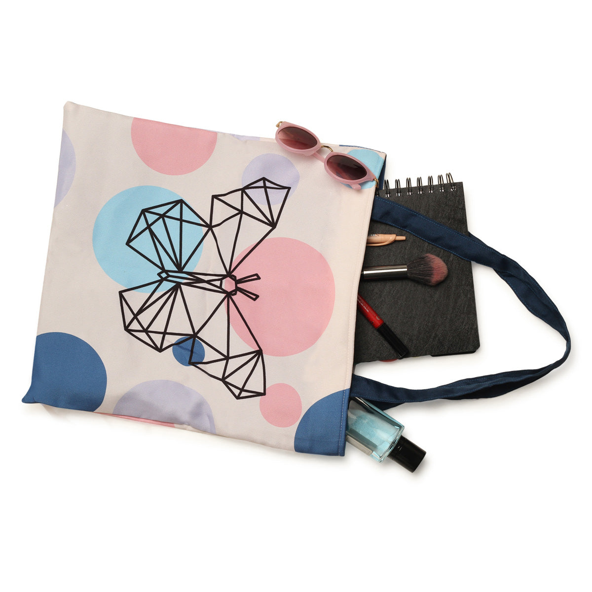 A stylish tote bag with a pink, blue, and white geometric pattern, perfect for adding a pop of color to any outfit.