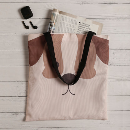 A tote bag featuring an adorable dog face design. Perfect for dog lovers on the go!