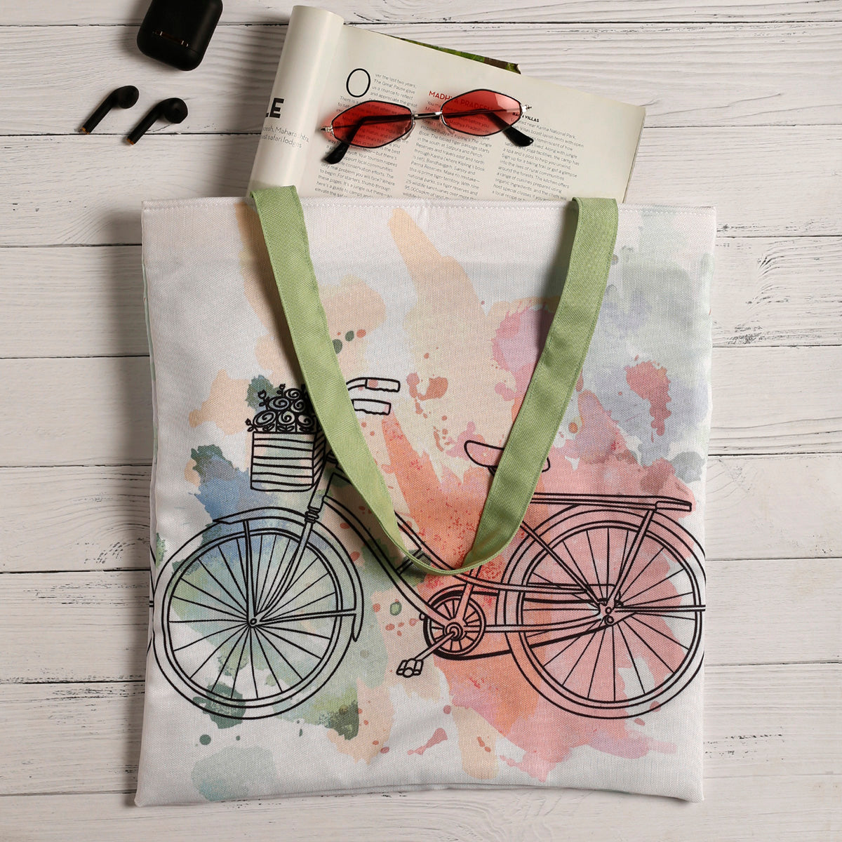 A stylish tote bag featuring a colorful bicycle design, perfect for carrying your essentials on the go.