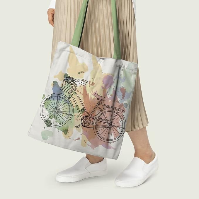 Fashionable tote bag showcasing a whimsical bicycle graphic, great for everyday use.