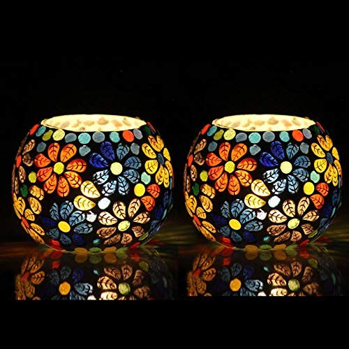 Bright glass tealights on table.
