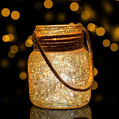 Glass jar with rope tied around it, rustic decor element for home or event.