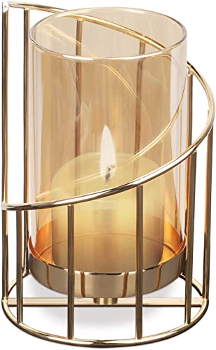 Elegant gold metal candle holder with glass candle