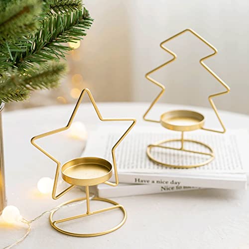 Two gold star-shaped candles on a table, adding a touch of elegance and warmth to the ambiance.