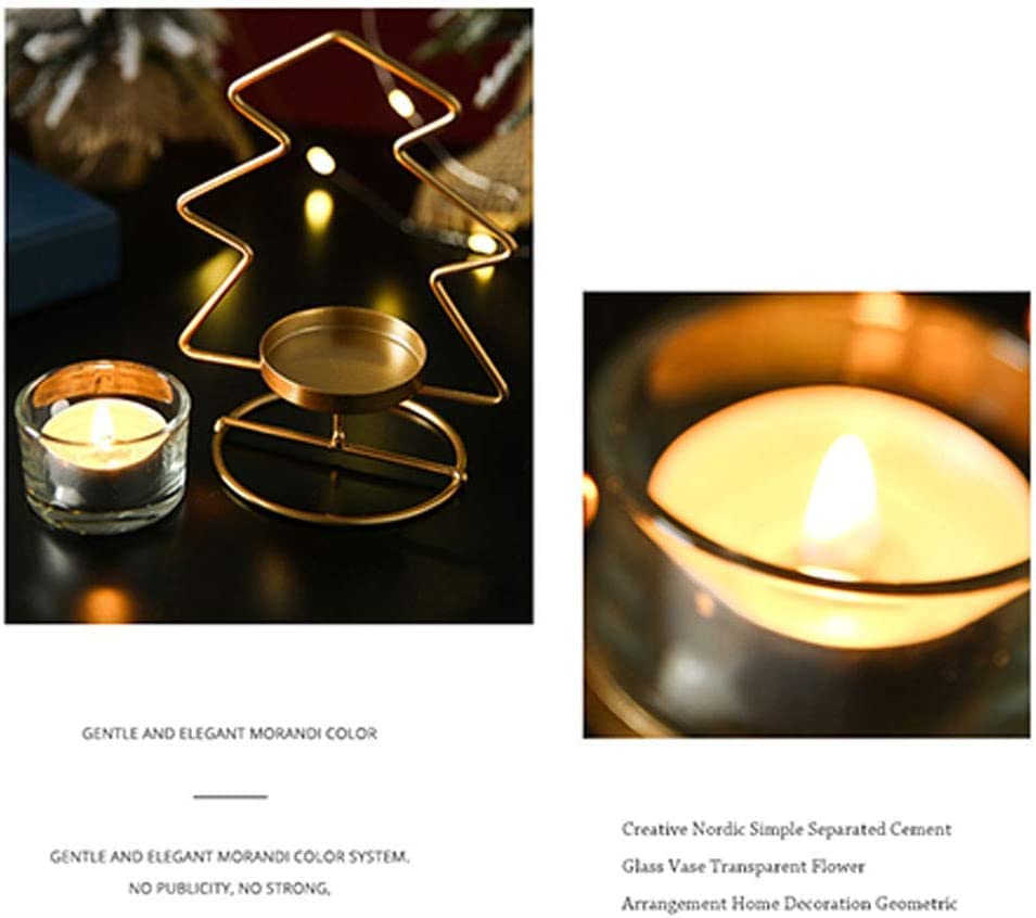 Two elegant gold star candles placed on a table.