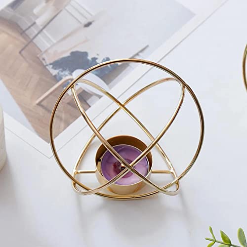 Shiny gold tealight holder with purple candle, perfect for relaxation.