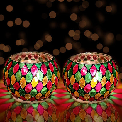 Two colorful glass lamps with gold and green designs.