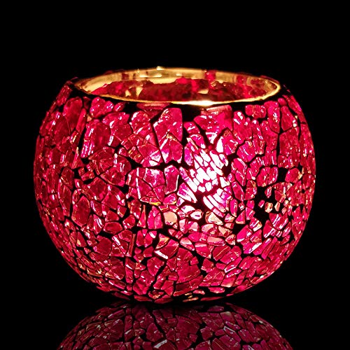 Red glass candle holder with elegant gold accents, perfect for adding a touch of sophistication to any room decor.
