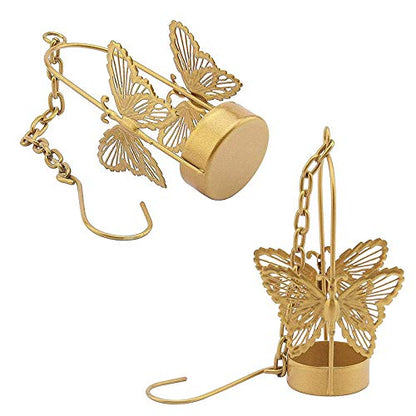 Two tealights with butterfly designs hanging in the air, casting a warm and inviting glow.