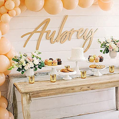 Gold tea light candle holder with intricate design, perfect for adding a touch of elegance to any room.