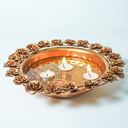 Ornate gold plate with red flower details and gold trim.