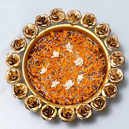 Elegant gold plate adorned with red floral patterns.