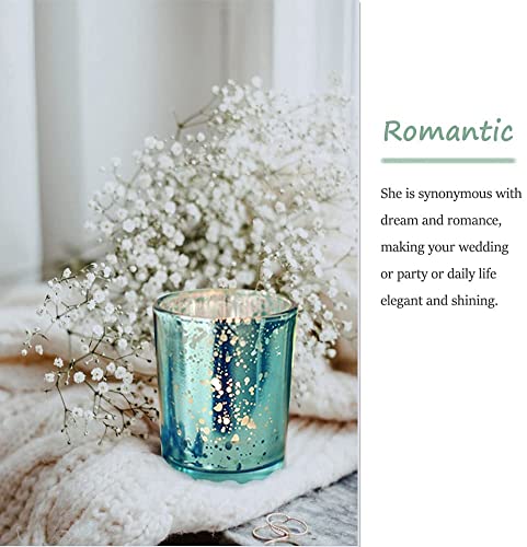Stylish teal glass candle holder with candles and plate