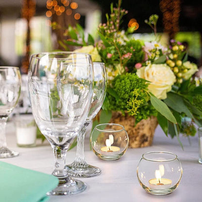 A glass bowl with a candle.