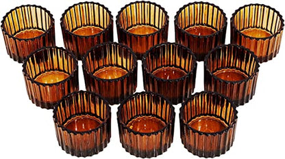 Table with six candles in glass cups