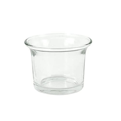 Elegant gold reindeer candle holder on a table.