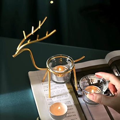 Gold reindeer candle holder displayed on a table