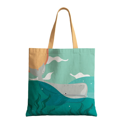 A tote bag featuring a charming whale and a sunny backdrop, ideal for eco-friendly shopping.