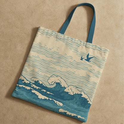 A tote bag illustrated with a bird in flight above rolling waves, symbolizing nature and tranquility.