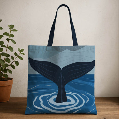 Whale tail tote bag featuring a blue whale design, showcasing marine life in a stylish and eco-friendly accessory.