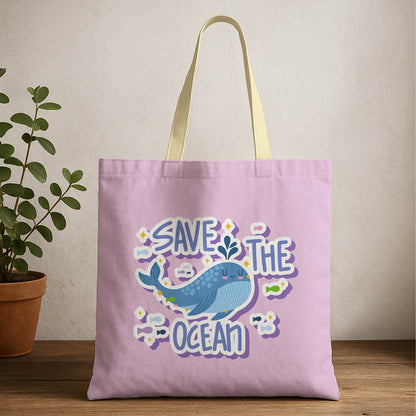 Tote bag featuring a "Save the Ocean" design with whale, ocean-themed graphics and vibrant colors.
