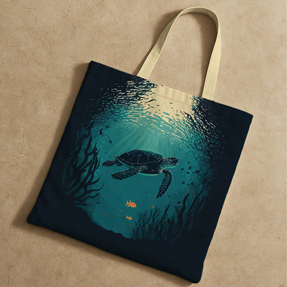 A tote bag displaying a sea turtle swimming in the ocean, highlighting the beauty of marine wildlife and ocean ecosystems.