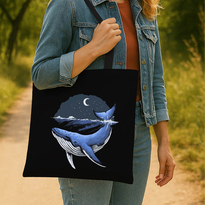 A tote bag depicting a blue whale gliding through the ocean, showcasing marine life in a stylish design.