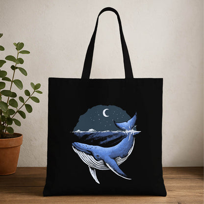 Whale tote bag featuring a blue whale swimming in the ocean against a vibrant blue background.