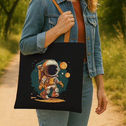 An astronaut-themed tote bag displaying a colorful cartoon image of an astronaut in a space suit.