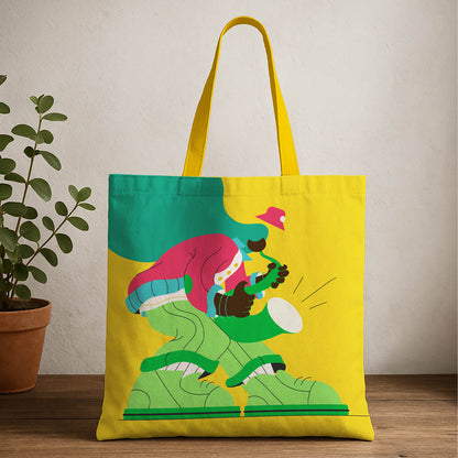Yellow tote bag featuring a cartoon character design, perfect for casual outings or shopping trips.