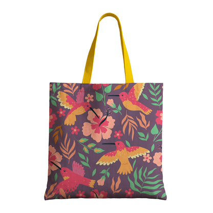 A lively tote bag featuring an artistic design of birds and flowers in vibrant colors, suitable for any occasion.