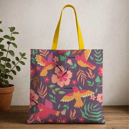 A vibrant tote bag featuring a design of colorful birds and flowers against a bright background.