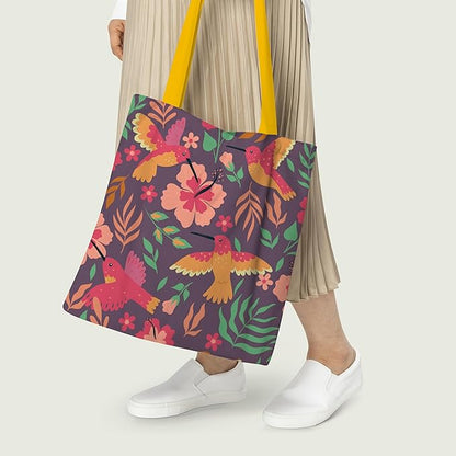 A colorful tote bag displaying a whimsical pattern of birds and flowers, ideal for carrying everyday essentials.