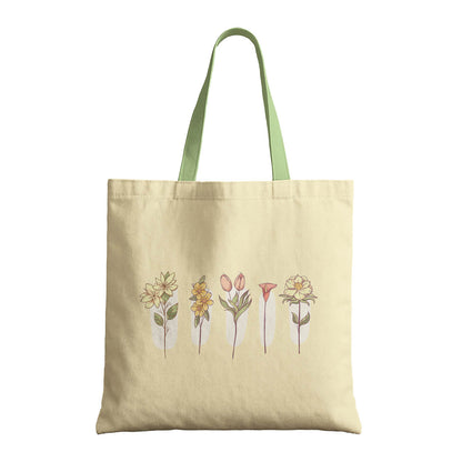 A tote bag with a cheerful flower print, ideal for shopping or casual outings.