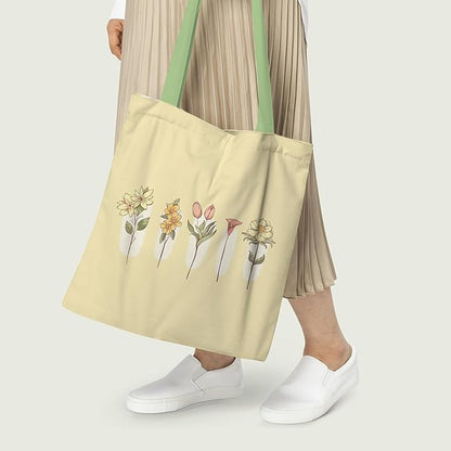 A floral-patterned tote bag, displaying a mix of colorful blooms on a sturdy fabric.