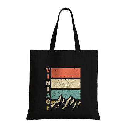 Retro-inspired mountain tote bag, designed for practicality and showcasing a beautiful outdoor landscape.