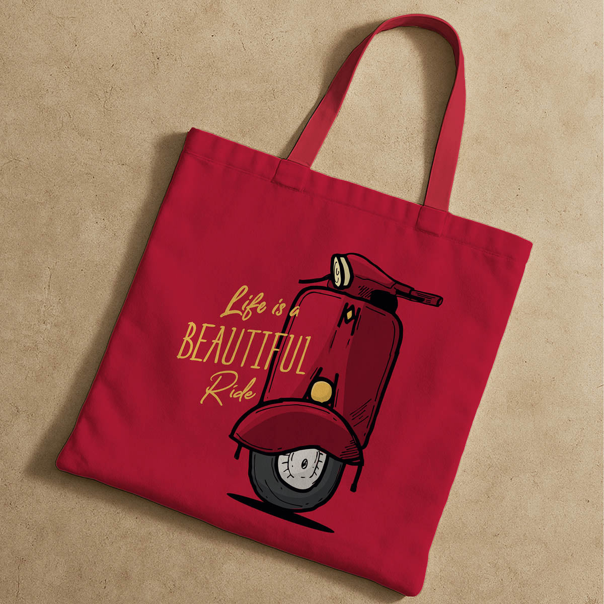 A red tote bag showcasing a scooter design prominently displayed.