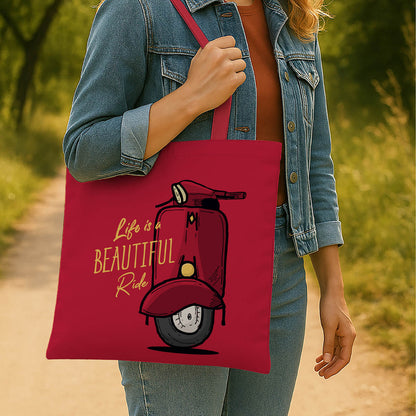 A vibrant red tote bag adorned with an illustration of a scooter.